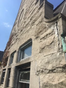 Historic façade restoration in progress on a Hyde Park building